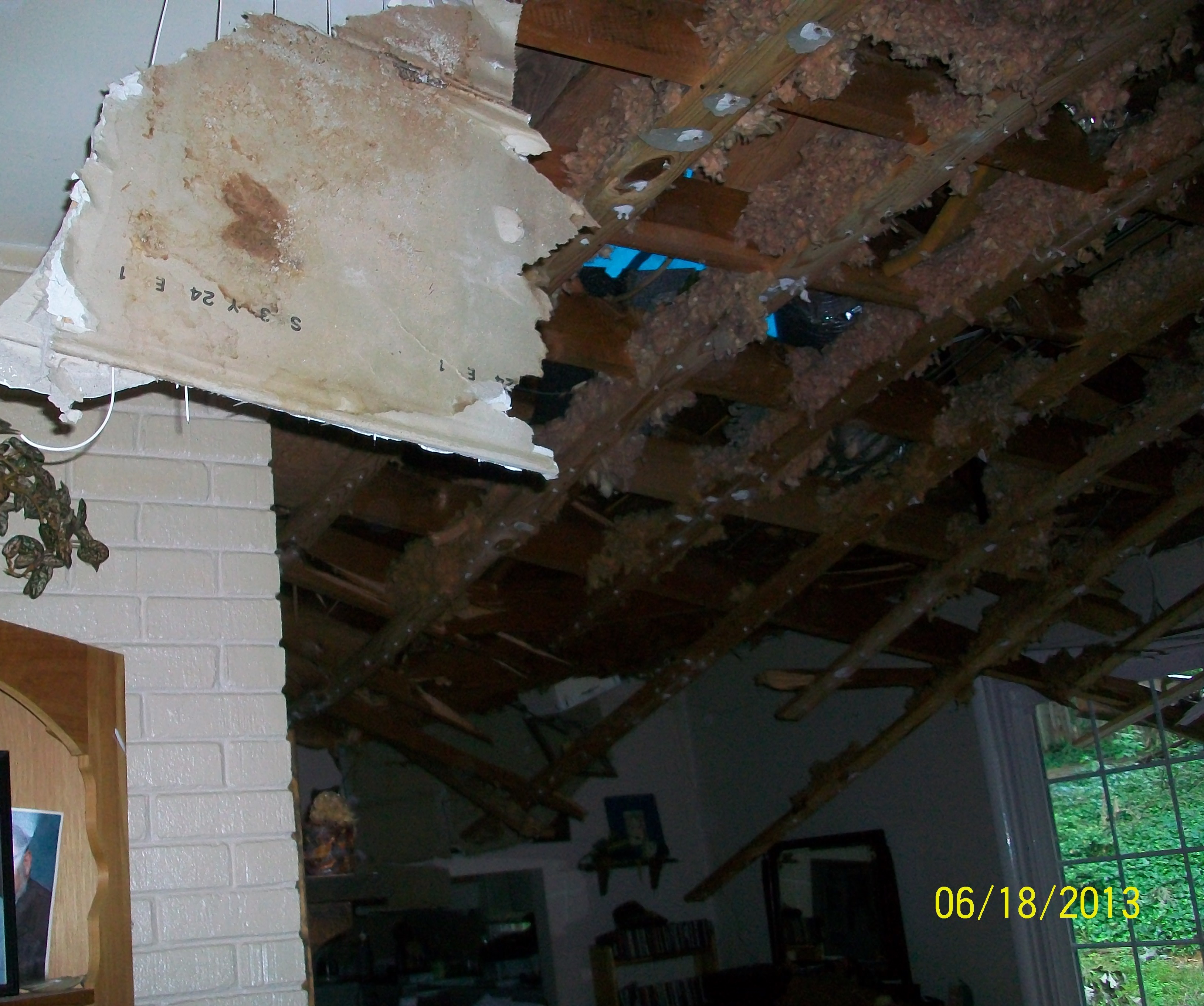 This room did NOT have an open cathedral ceiling prior to the storm
